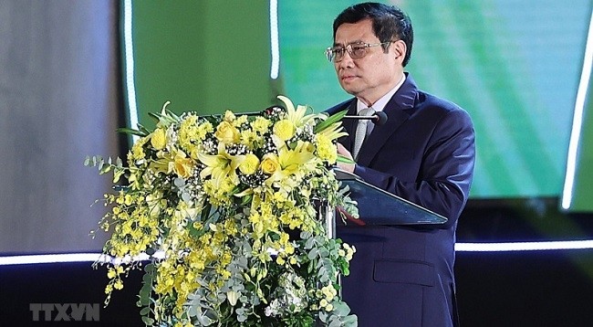 Премьер-министр Вьетнама Фам Минь Тьинь выступает с речью на мероприятии. Фото: Чан Хай 