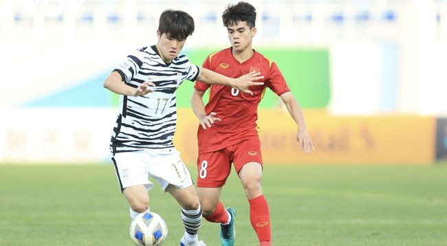 Сборная U23 Вьетнама упорно боролись перед давлением со стороны сборной U23 Южной Кореи. Фото: Нгок Зюи