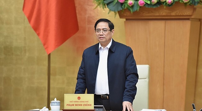 Премьер-министр Фам Минь Тьинь. Фото: Чан Хай