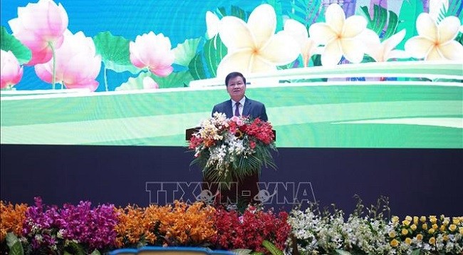 Генеральный секретарь ЦК НРПЛ, Президент Лаоса Тхонглун Сисулит выступает на церемонии. Фото: VNA