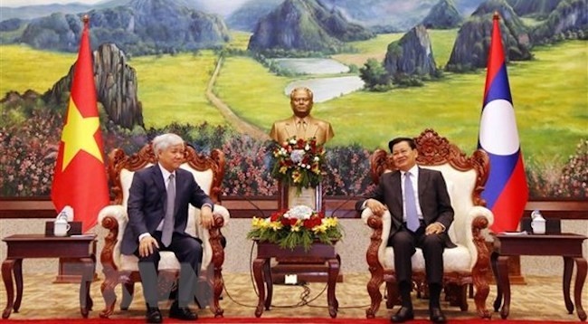 Председатель ЦК ОФВ До Ван Тьиен и Генеральный секретарь ЦК НРПЛ, Президент Лаоса Тхонглун Сисулит. Фото: VNA