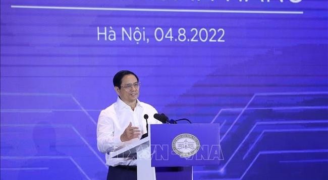 Премьер-министр Фам Минь Тьинь выступает на мероприятии. Фото: VNA